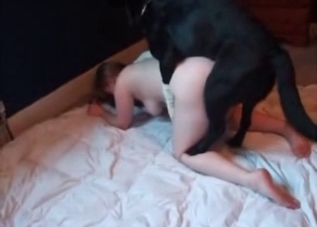 Pale-skinned babe raped by a black dog
